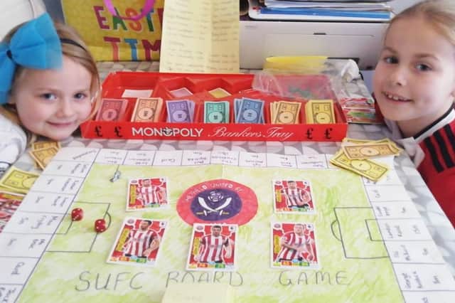 Isabelle and Hollie with their SUFC Monopoly