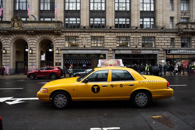 Glasgow stands in for the city of Chicago , yellow taxis cab