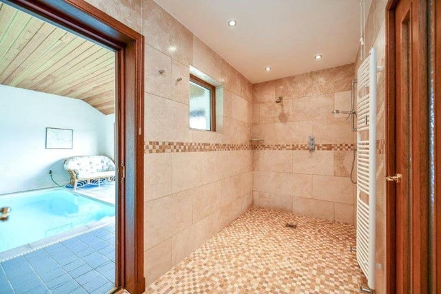 The swimming pool has its own shower room.