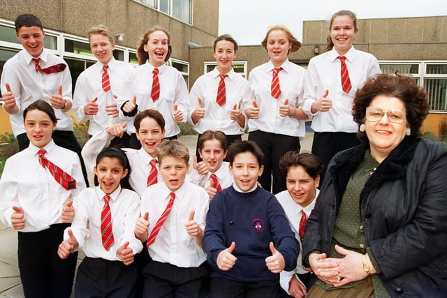 Hungerhill School retiring dinner lady Edith Whalley gets a rousing send off from her grandson Mark Whalley (wearing blue sweatshirt) and some of his fellow pupils in 1998
