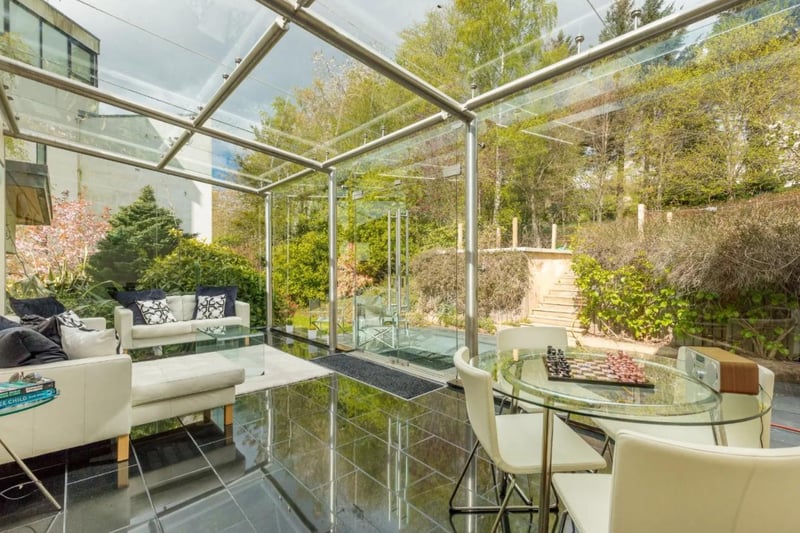 This five bed detached Edinburgh home is stunning and also enjoys its own gym, sauna and jacuzzi. You would even get a self-contained one bedroom flat with a private entrance included. It's on the market for offers over £3,450,000.