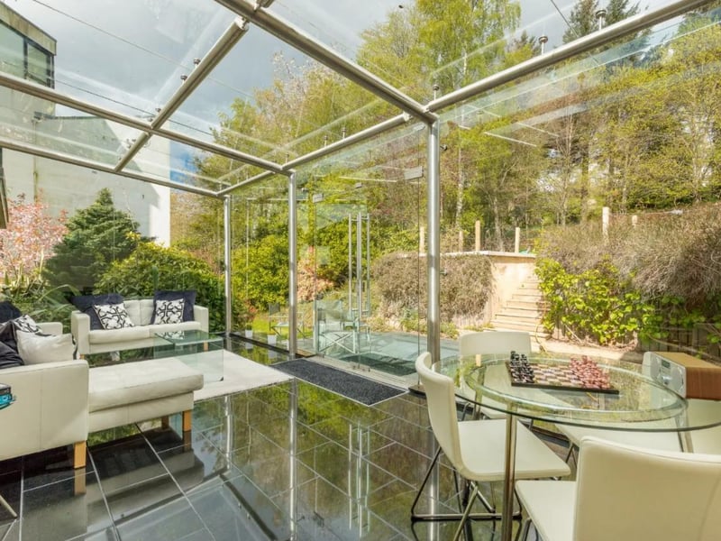 This five bed detached Edinburgh home is stunning and also enjoys its own gym, sauna and jacuzzi. You would even get a self-contained one bedroom flat with a private entrance included. It's on the market for offers over £3,450,000.