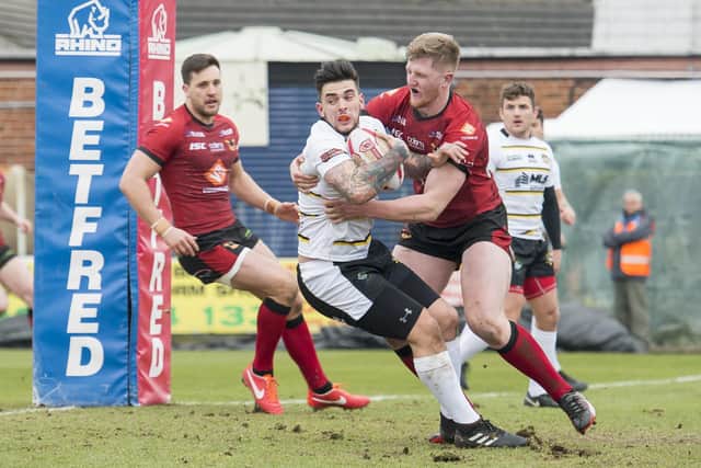 Liam Kirk gets a tackle in while playing for Bradford Bulls. Picture: Allan McKenzie.