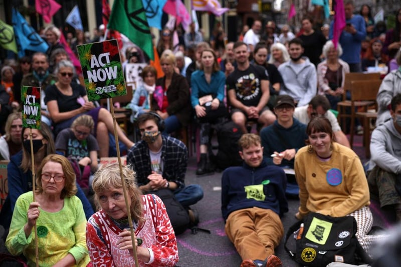 Protesters sit in the road as part of the protest in Covent Garden (Photo by Dan Kitwood/Getty Images)