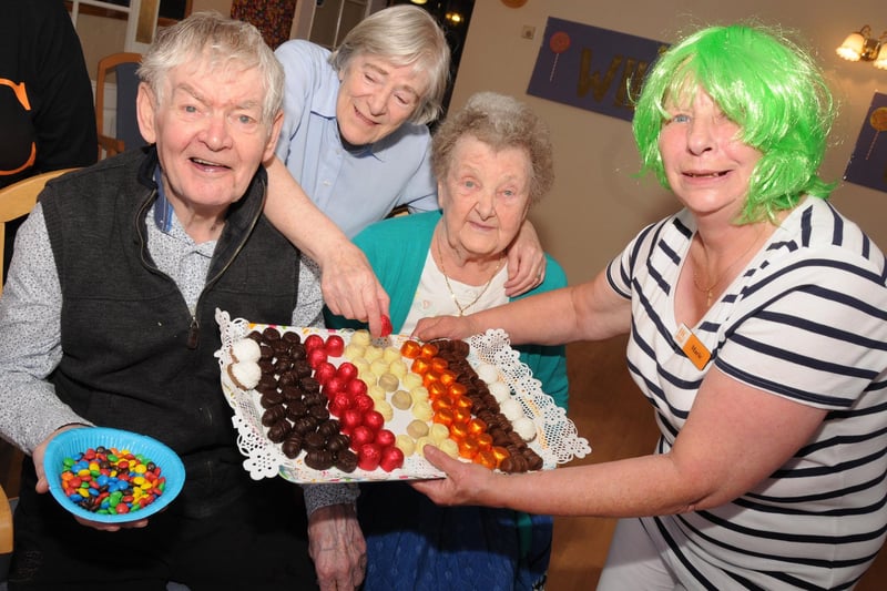 It's such a lovely memory from the Ashton Grange Care Home where, in 2013,Marie Middleton handed out chocolates to residents, L-R, Tom and Doreen Scott and Mary Newton as part of their Charlie and the Chocolate Factory themed open day.