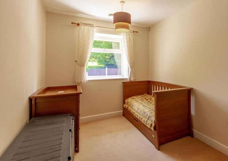 Another well-appointed bedroom. It offers plenty of potential to accommodate your own ideas.
