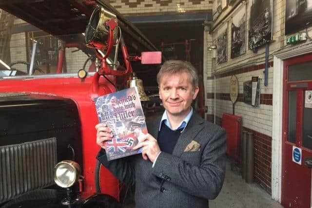 Neil Anderson and one of his books on the Sheffield Blitz at the National Emergency Services Museum