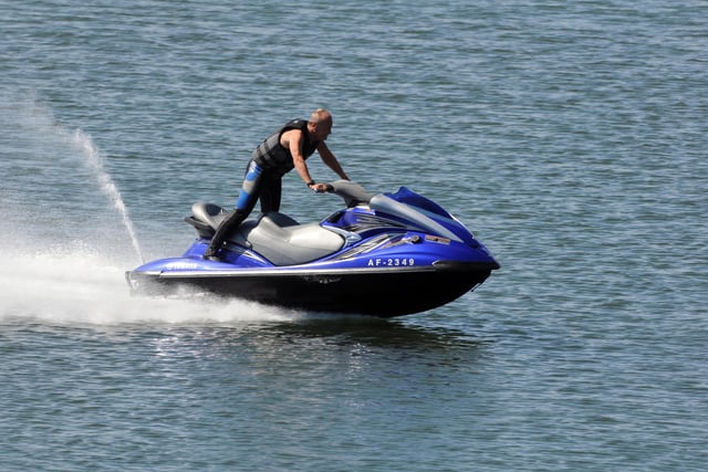 A jet skier enjoys the perfect conditions in the Littlehaven Beach harbour.