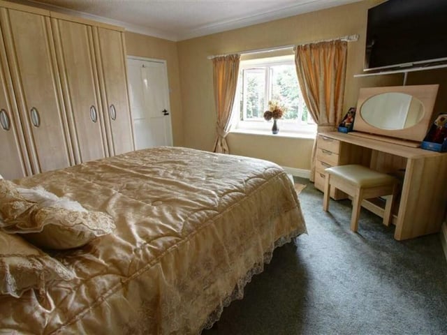 One of the three bedrooms.
