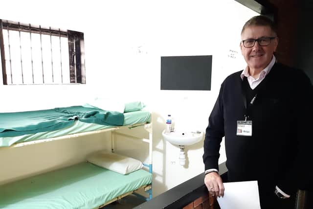 In2Change founder Brian Wreakes with the centre's reproduction prison cell.
