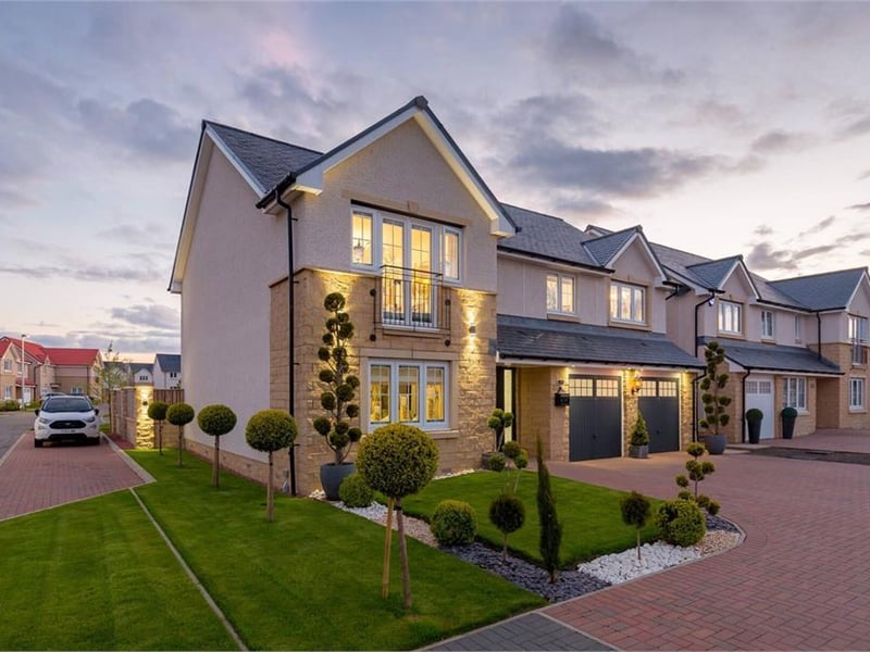 Property with front and side lighting.