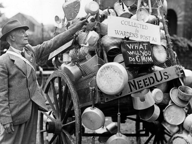 This handcart at Gosport was piled high with aluminium items when the town's ARP wardens made their own collection in July 1940. The News PP513