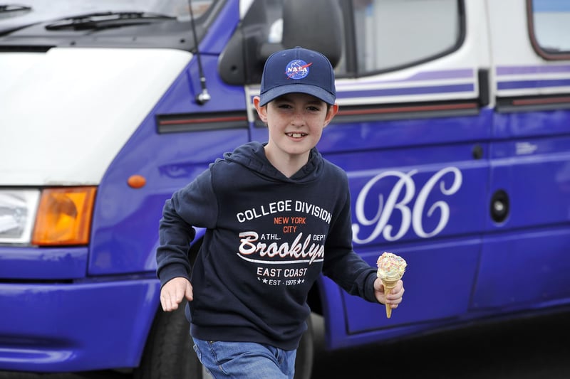 Ice cream was the order of the day as St Bernadette's Primary School in Stenhousemuir held a Silver Jubilee picnic for Reverend John McInnes. Picture: Michael Gillen.