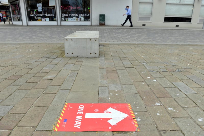 Markers were put in place across the town centre to help people socially distance. One-way systems were part of the efforts.