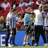 Owls boss Darren Moore with instructions to Michael Ihiekwe going into extra time    PIc Steve Ellis