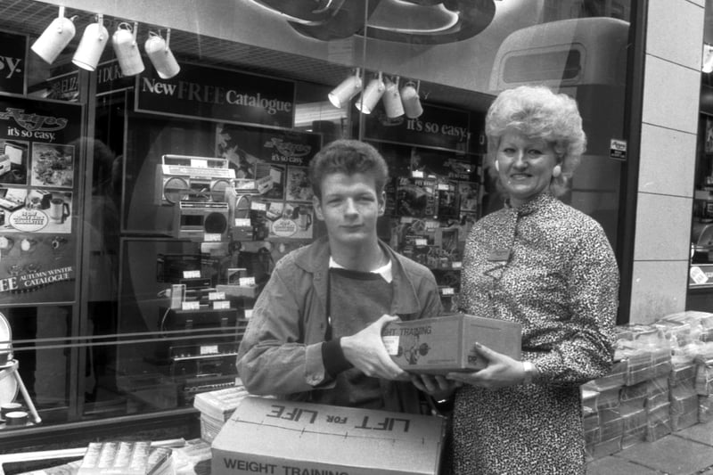 One of the first customers at the new Argos catalogue shop on North Bridge, Edinburgh, just opened in September 1985.