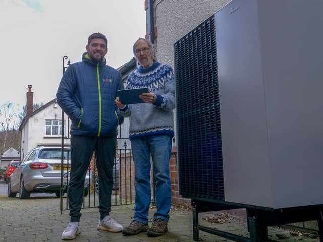 Award-winning heating engineer Damon Blakemore with happy Sheffield resident Rob Ritchie.