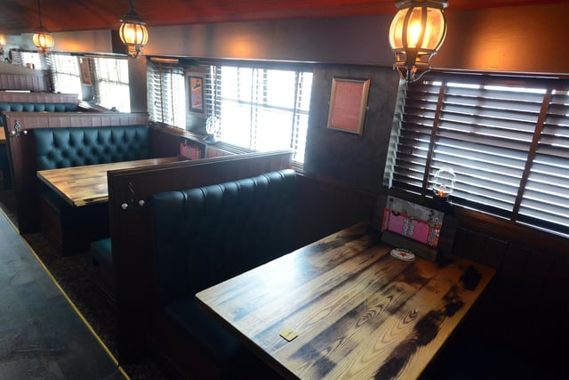 Booths are ready to welcome diners.