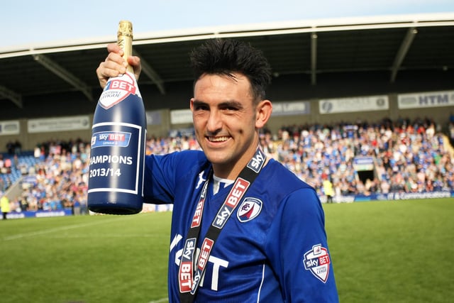 Gary Roberts toasts Chesterfield's title win.