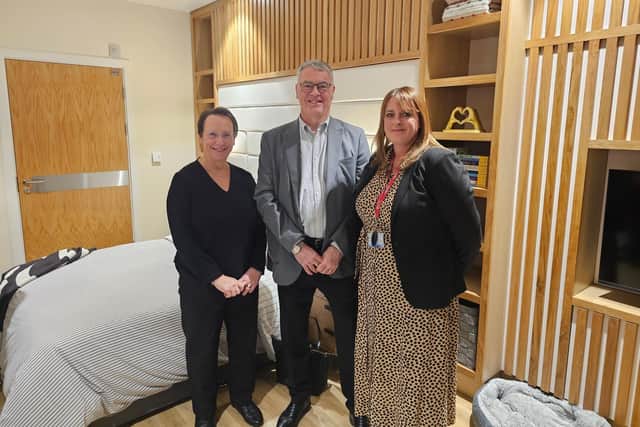 Julie and Neil MacDonald with St Luke's Chief Executive Jo Lenton (right) in the new Family Suite.