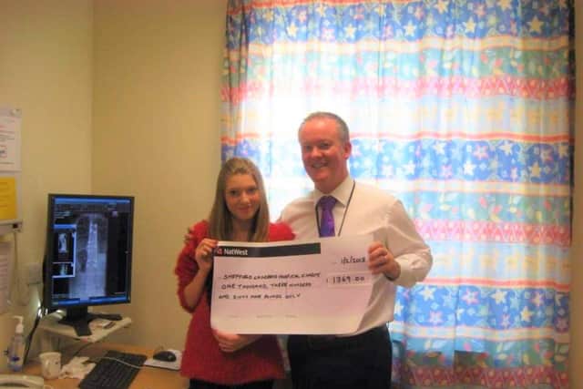 Anna Walliss and Consultant Spinal Surgeon Mr Lee Breakwell after her first fundraising in 2013