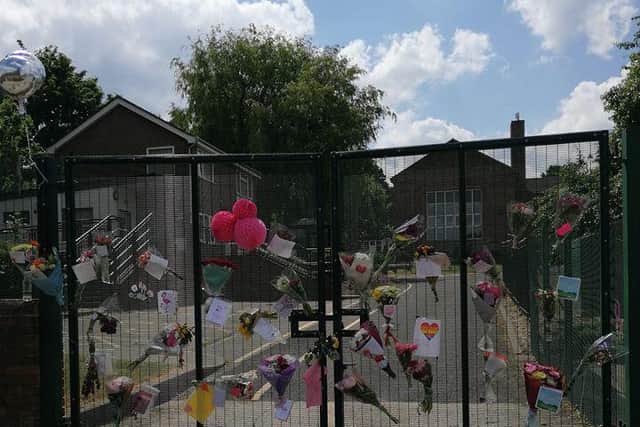 Tributes left to Johanne at the gates of Monteney Primary School.