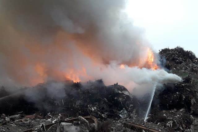 A huge scrap yard fire which broke out in Sheffield yesterday is continuing today (SYFR)