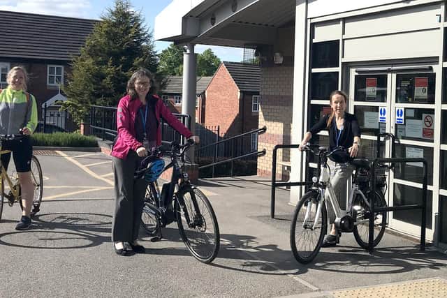 Medical staff at the White House Surgery, Fairfax Rise, Manor, with their e-bikes