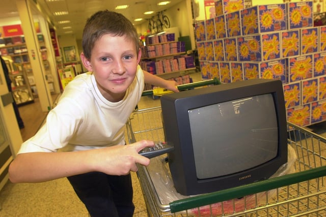 Kristoffer Handley, aged 11, of Woodlands, with the TV he won in a quiz draw at the Carcroft Asda.