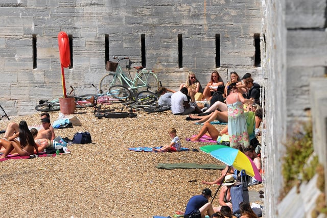 People flocked to the Hot Walls in Old Portsmouth on Thursday, May 21 - the hottest day of the year. Picture: Sarah Standing (210520-2433)