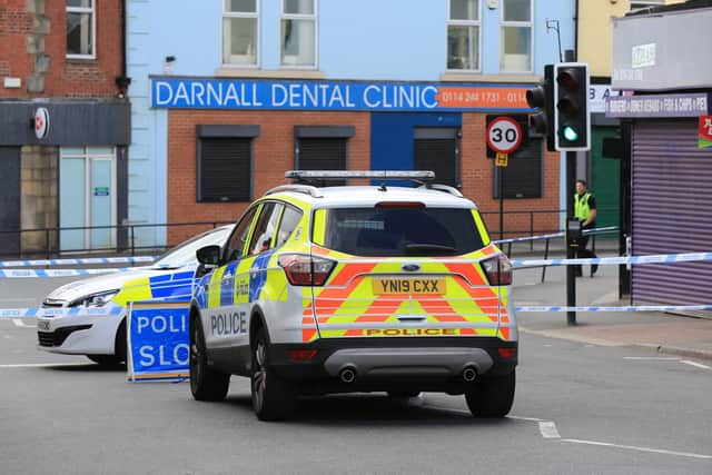 Police at the scene of a stabbing on Staniforth Road in Darnall.