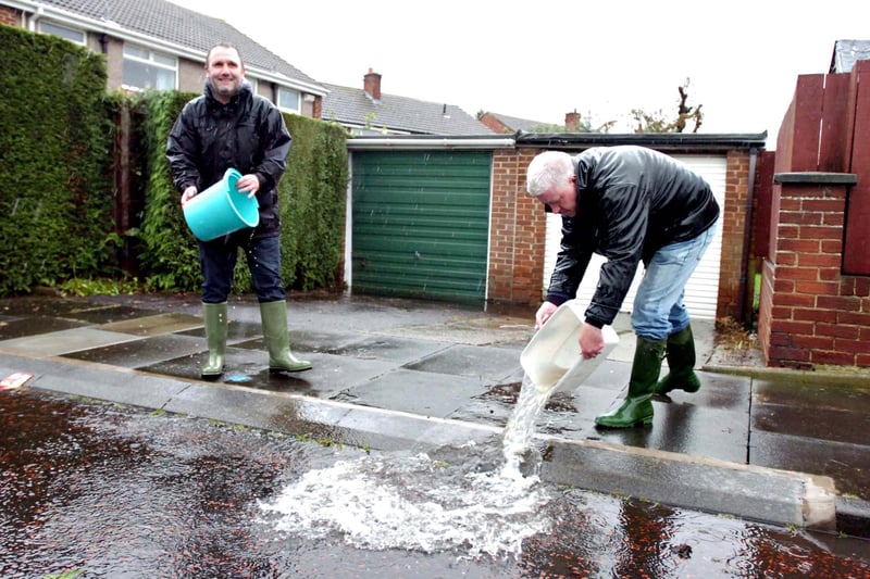 Clearing up after the flooding in Houghton in September 2012. Britain was hit by a series of flash floods that year including in the North East in June and September, with 23,000 homes left without electricity at one point.