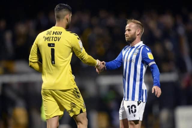 Sheffield Wednesday captain Barry Bannan shakes hands after their 1-1 draw with Cambridge United.