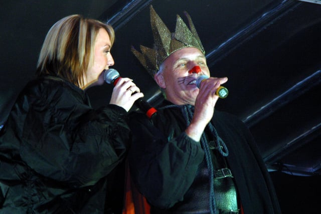 Becky from radio station Peak 107 with ex-Eastender turned panto star preparing to switch on the Christmas lights in 2002