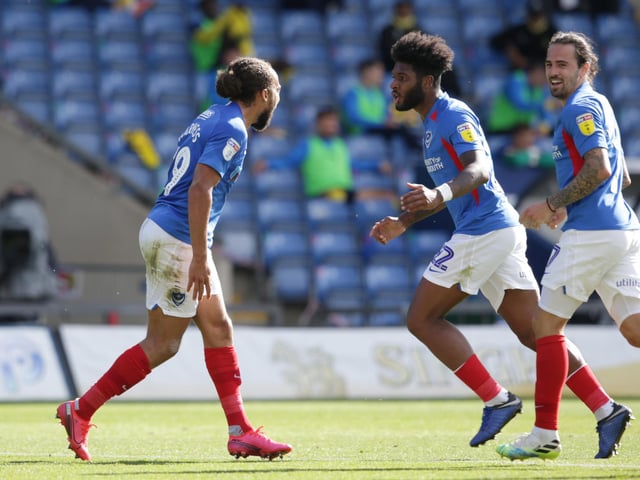 Ryan Williams and Ellis Harrison rush to congratulate team-mate Marcuss Harness after he opened the scoring.