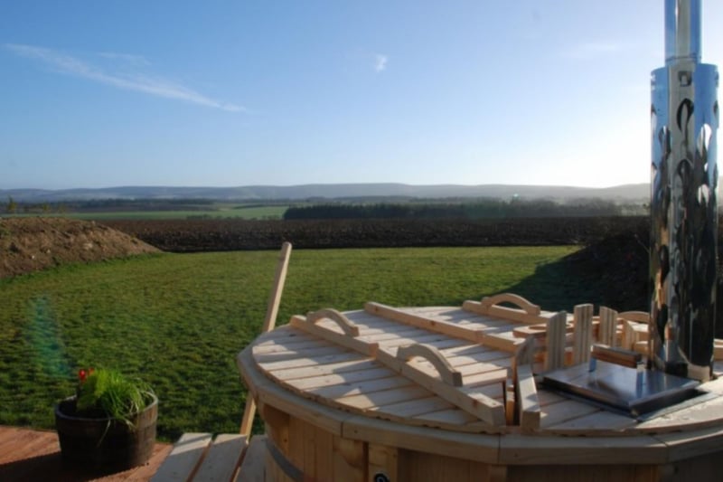 The wood-fired private hot tubs have beautiful views over the Lammermuir Hills and the East Lothian countryside.