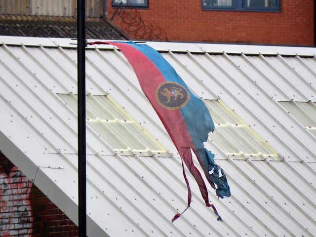 Filming in Sheffield for new HBO miniseries The Regime, starring Kate Winslet and Hugh Grant. A tattered flag can be seen fluttering in the breeze here during filming around an old steel cementation furnace in Shalesmoor. Photos by @steelcitysnaps via Twitter