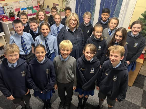 Long-serving teacher Mairead Shipley with current Prep 6 pupils at Mylnhurst Preparatory School in Ecclesall
