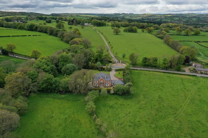 Hart Lodge is set well back from Matlock Road within 1.5 acres.