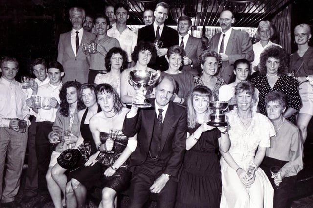 Star Walk prize winners are pictured after the presentations at Josephine's, Sheffield, with, centre, men's and women's winners, Philip Ward and Gillian Watson, June 5, 1990