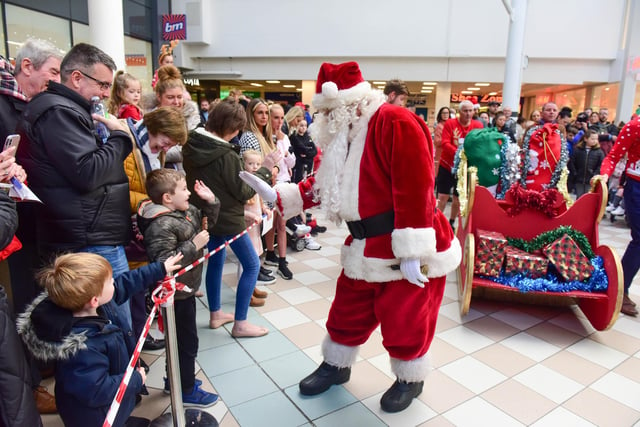 'High fives' with Santa at Middleton Grange Shopping Centre, on Sunday, November 21.