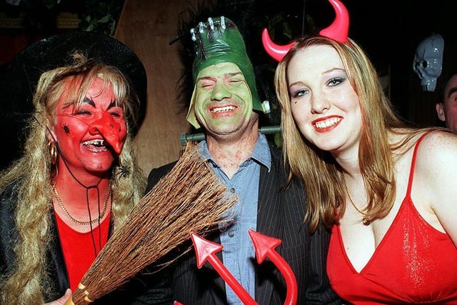 Pictured at the Royal Oak Halloween party, Earsham Street, are, left to right, landlady Melanie Cannetti, Darren Slimm and Berni Finnerty, October 1998