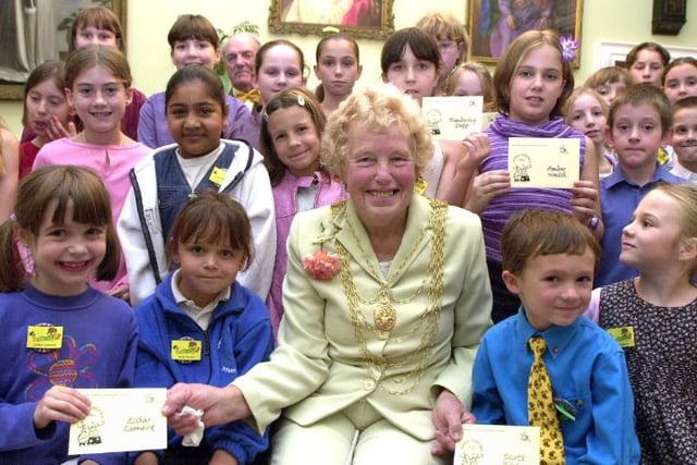 Beryl Roberts presenting the winners of Doncaster Libraries' summer reading game their prizes in 2001.