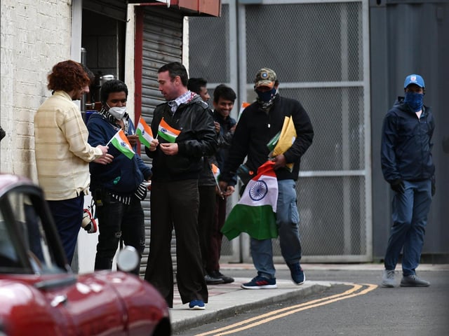 Many on set wore face coverings and the Indian flag was on show.