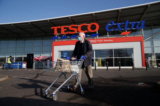 Tesco is asking that only one person per household enter the store, face masks are also required by law. Tesco also has a priority shopping hour every Wednesday and Sunday between 9am-10am for our more vulnerable and elderly customers. NHS, emergency service and care workers now have priority access at any time. Picture: Hollie Adams/ Getty Images