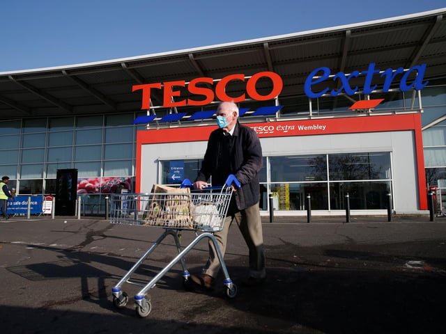 Tesco is asking that only one person per household enter the store, face masks are also required by law. Tesco also has a priority shopping hour every Wednesday and Sunday between 9am-10am for our more vulnerable and elderly customers. NHS, emergency service and care workers now have priority access at any time. Picture: Hollie Adams/ Getty Images