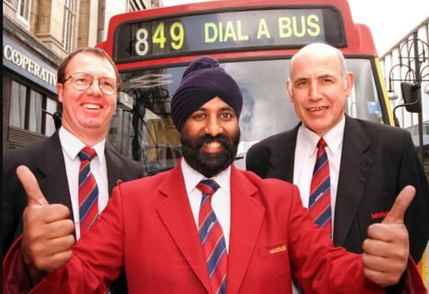 Jamal Singh celebrated passing his bus driving exams in 1998.