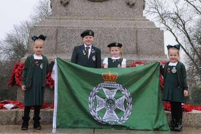Youngsters Bobbi Barrs, Leon and Alexis Ronald and Franki Barrs at Sunderland's Burdon Road war memorial on Remembrance Sunday.
