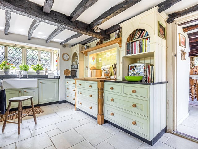 This three bedroom Grade II listed thatched cottage in Nether Wallop is on the market for £900,000. It is listed by Fine and Country.