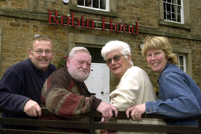 Pictured are George and Joan Laing (centre) with their daughter Cath and son-in-law David Fleet who are leaving the Robin Hood Pub, Little Matlock, Stannington, after more than 30 years, October 8, 2003